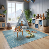 Blue leaf-patterned area rug on wooden floor in a child's room with toys and furniture