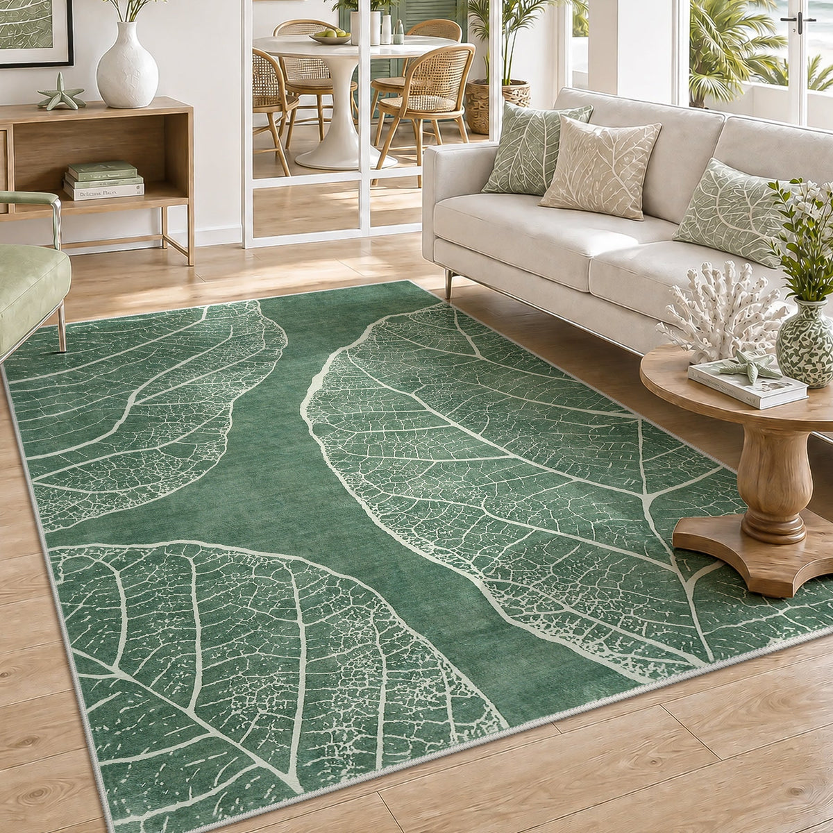 Green leaf pattern area rug on wooden floor in a living room with sofa and side table