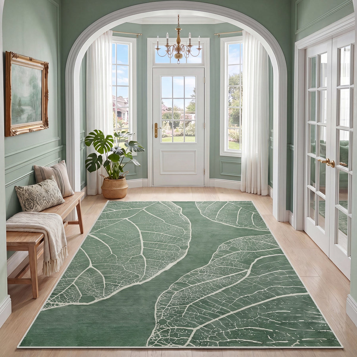 Green leaf pattern rug on hardwood floor in arched entryway with white trim and potted plant