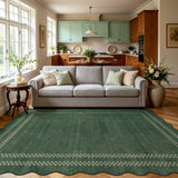 Scalloped green area rug with white geometric border on hardwood floor in living room