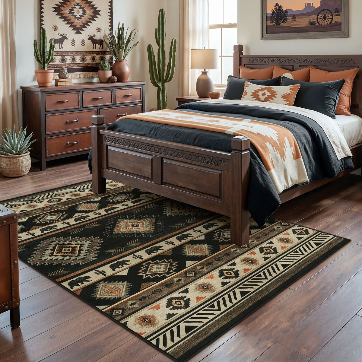 Southwestern patterned area rug in black, beige, and orange on hardwood floor in bedroom