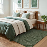 Green geometric patterned jute area rug on wooden floor in bedroom