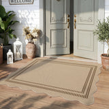 Scalloped beige jute rug with brown border on wooden porch near double doors