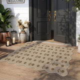 Beige floral patterned jute rug on wooden porch in front of black doors