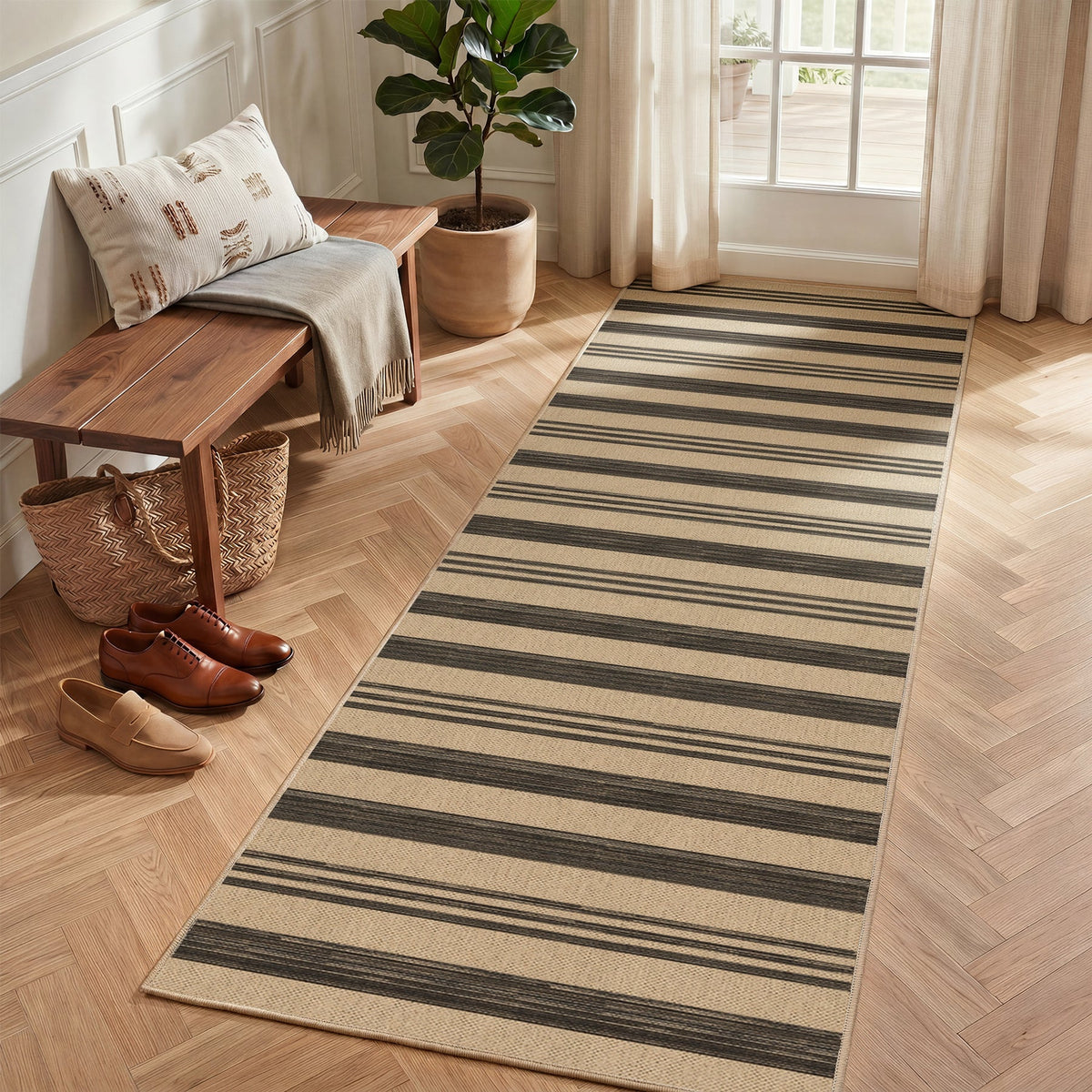 Striped jute runner rug in beige and dark gray on light wood floor near bench and shoes