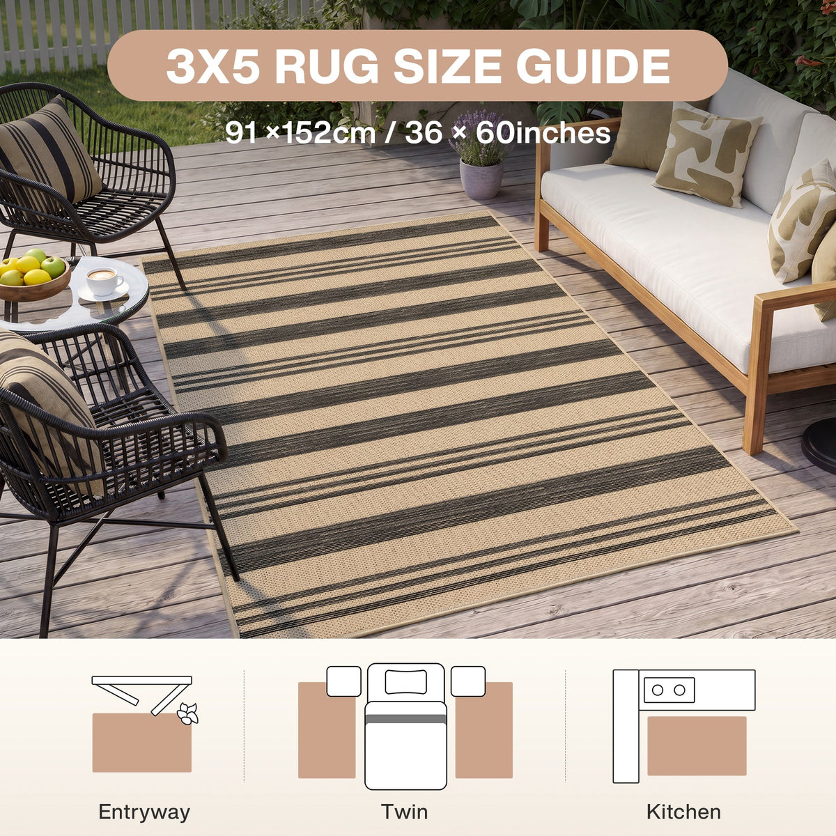 Striped beige and brown jute rug, 36 x 60 inches, on wooden deck with outdoor furniture