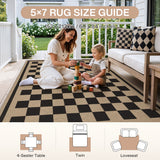 Black and beige checkered jute rug on porch with woman and child playing, 152 x 213cm size guide shown