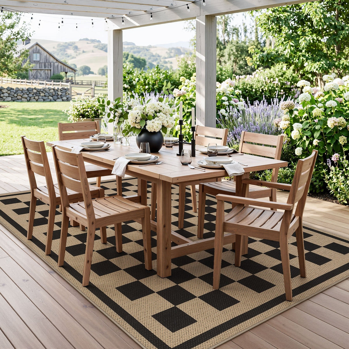 Black and beige checkered jute rug on wooden deck under pergola with outdoor dining set