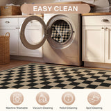 Black and beige checkered jute rug on kitchen floor with open washing machine