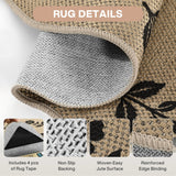 Close-up of beige floral jute rug showing backing, weave, pattern, and reinforced edge binding