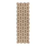 Beige jute runner rug with brown floral pattern, scalloped edges, shown flat