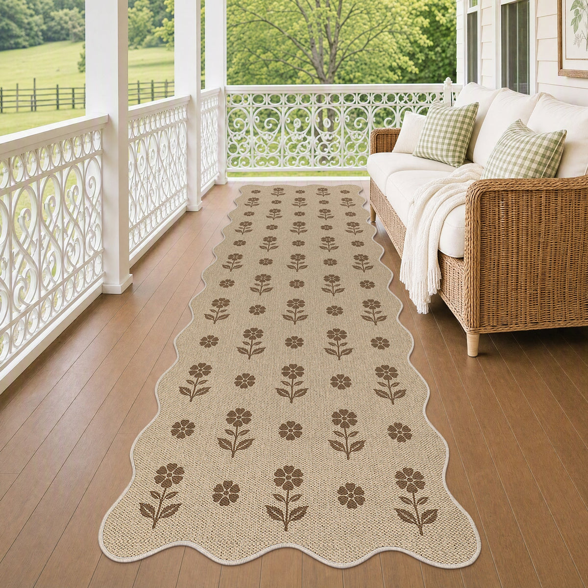 Beige floral jute runner rug on wooden porch with wicker sofa and white railing