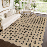 Beige jute rug with black floral pattern on wooden floor in a furnished porch setting