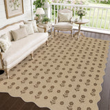 Beige jute rug with brown floral pattern on wooden floor in a furnished porch setting