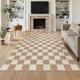 Beige and cream checkered area rug on light wood floor in a living room with sofa and fireplace