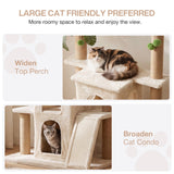 Calico cat resting on wide beige platform of 61" cat tree tower with sisal posts and green pom-poms