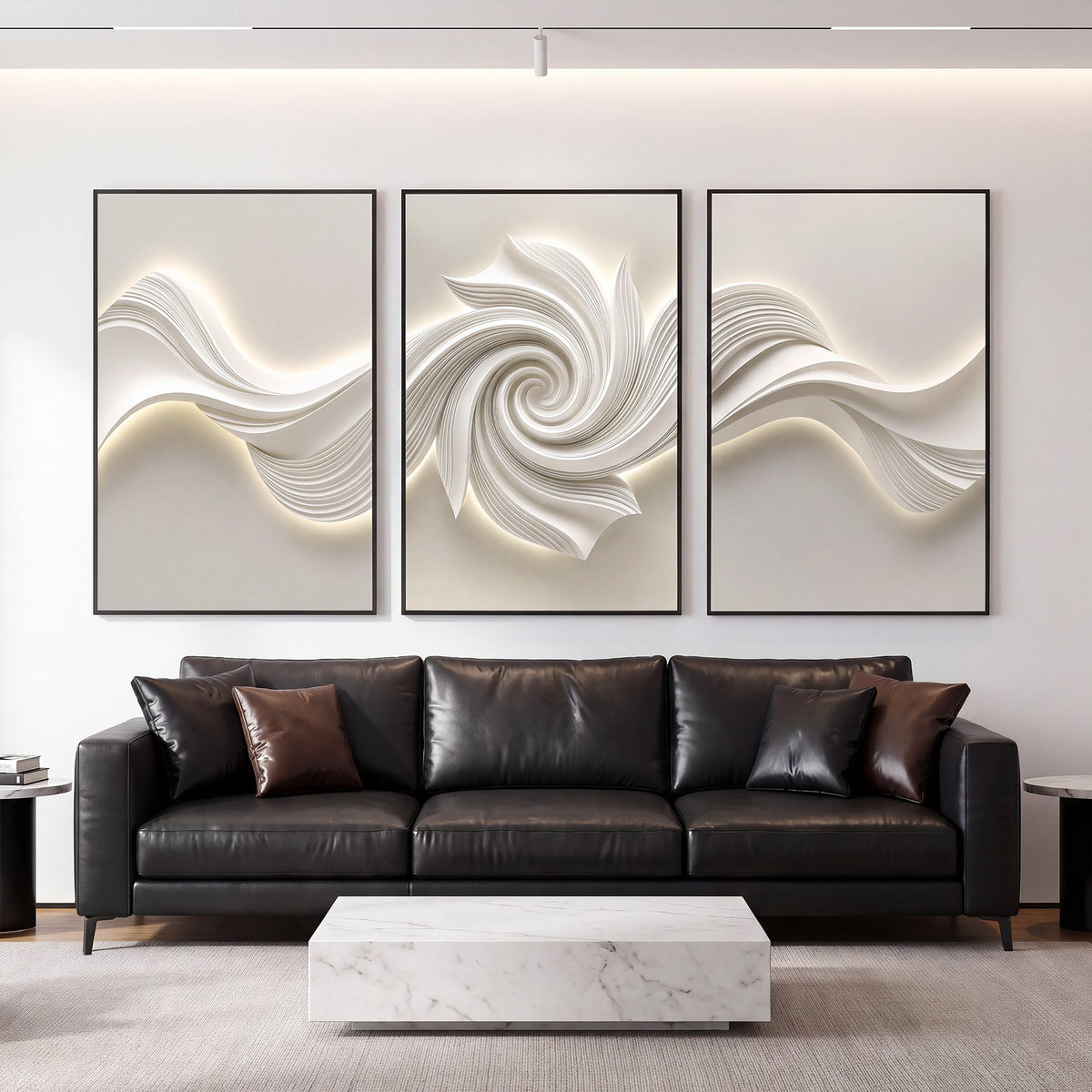 Three large black-framed abstract canvas artworks with 3D textured swirls, mounted above a black leather sofa in a living room