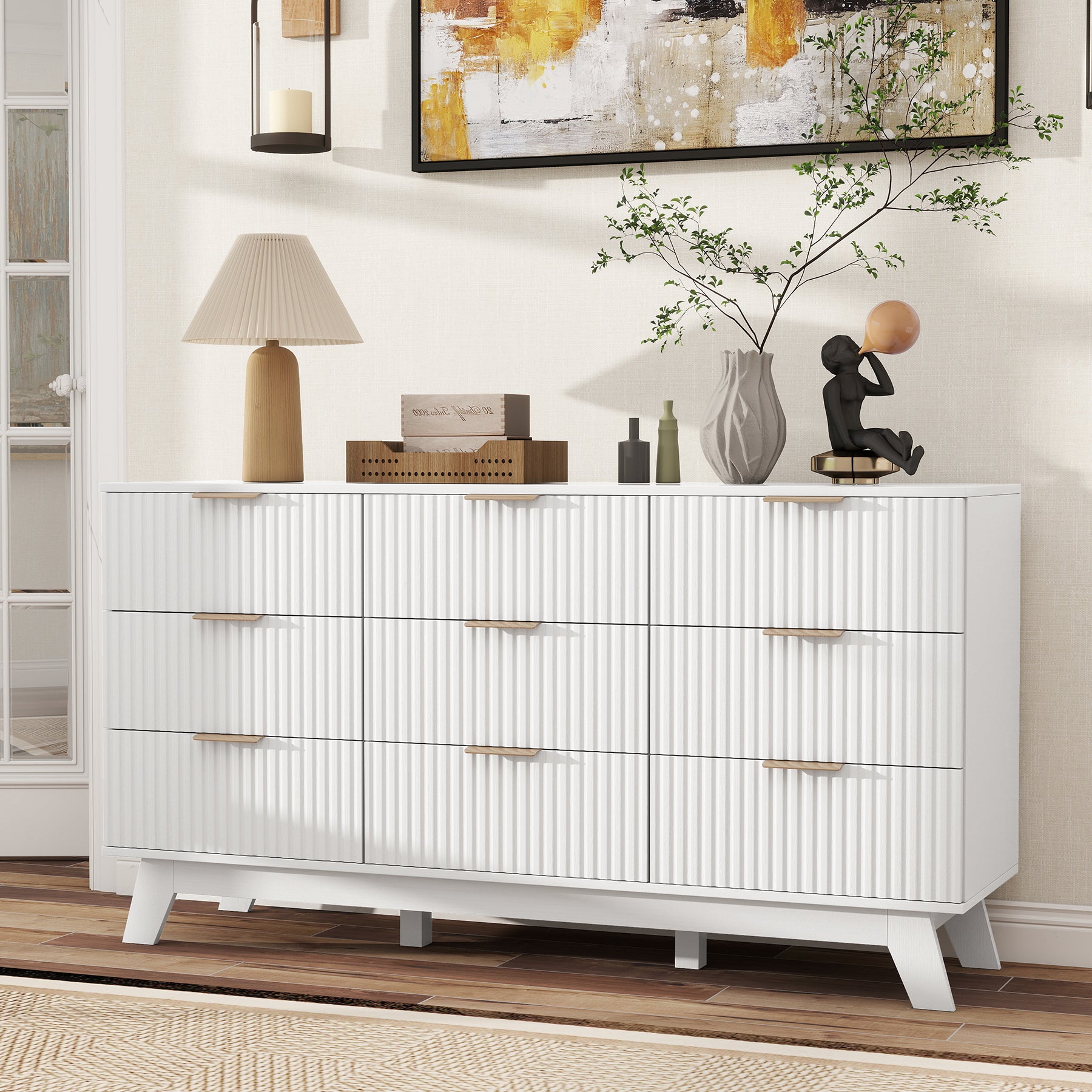 Modern white solid oak 9-drawer dresser with fluted fronts and gold handles, front view