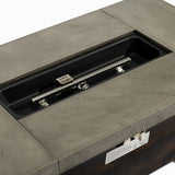 Grey and brown rectangular fire pit table with removable lid, shown at an angled close-up
