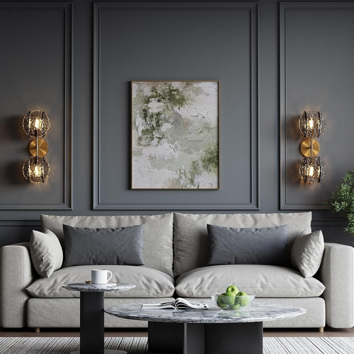 Gold wall sconce with two textured smoke glass globe lights mounted on dark grey wall