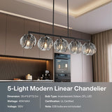 Five-light linear chandelier with smoky gray glass shades and matte black frame, shown in a kitchen setting, 39.4*5.9*72.3 in