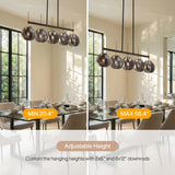 Five-light linear chandelier with smoky gray shell glass and black gold frame, shown in dining room with adjustable height indicators