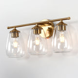 Three-light gold bathroom vanity light with bubble glass shades, shown from front angle