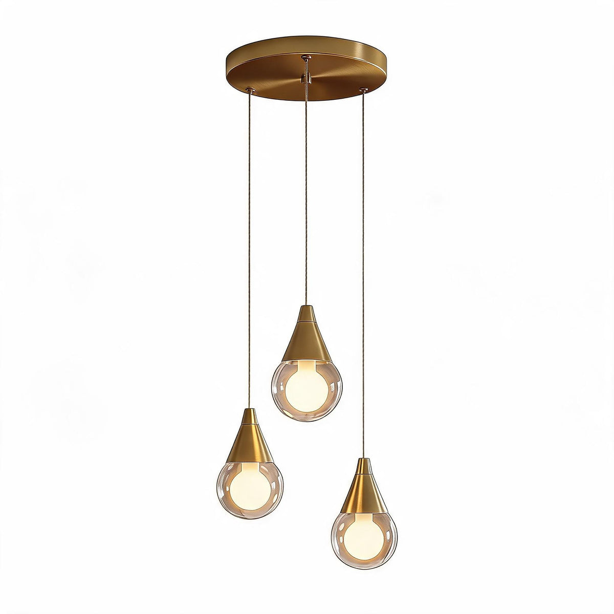 Brushed brass three-light pendant with glass shades, shown from above