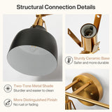 Black and gold bathroom vanity light with three metal bell shades shown from side angle