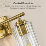 Brushed gold bathroom vanity light with fluted glass shade, angled view