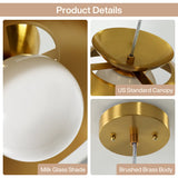 Close-up of brass dome pendant light with milk glass shade and brushed brass body