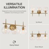Brushed brass three-light vanity light with clear globe shades, shown mounted upward