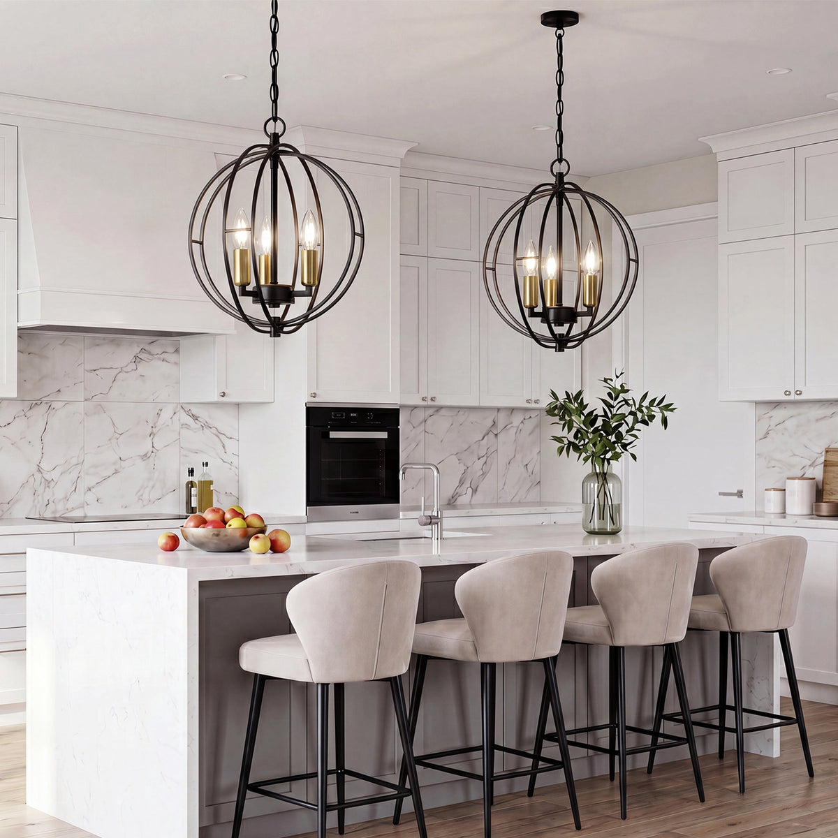 Black metal globe cage pendant light with gold bulbs, hanging over kitchen island