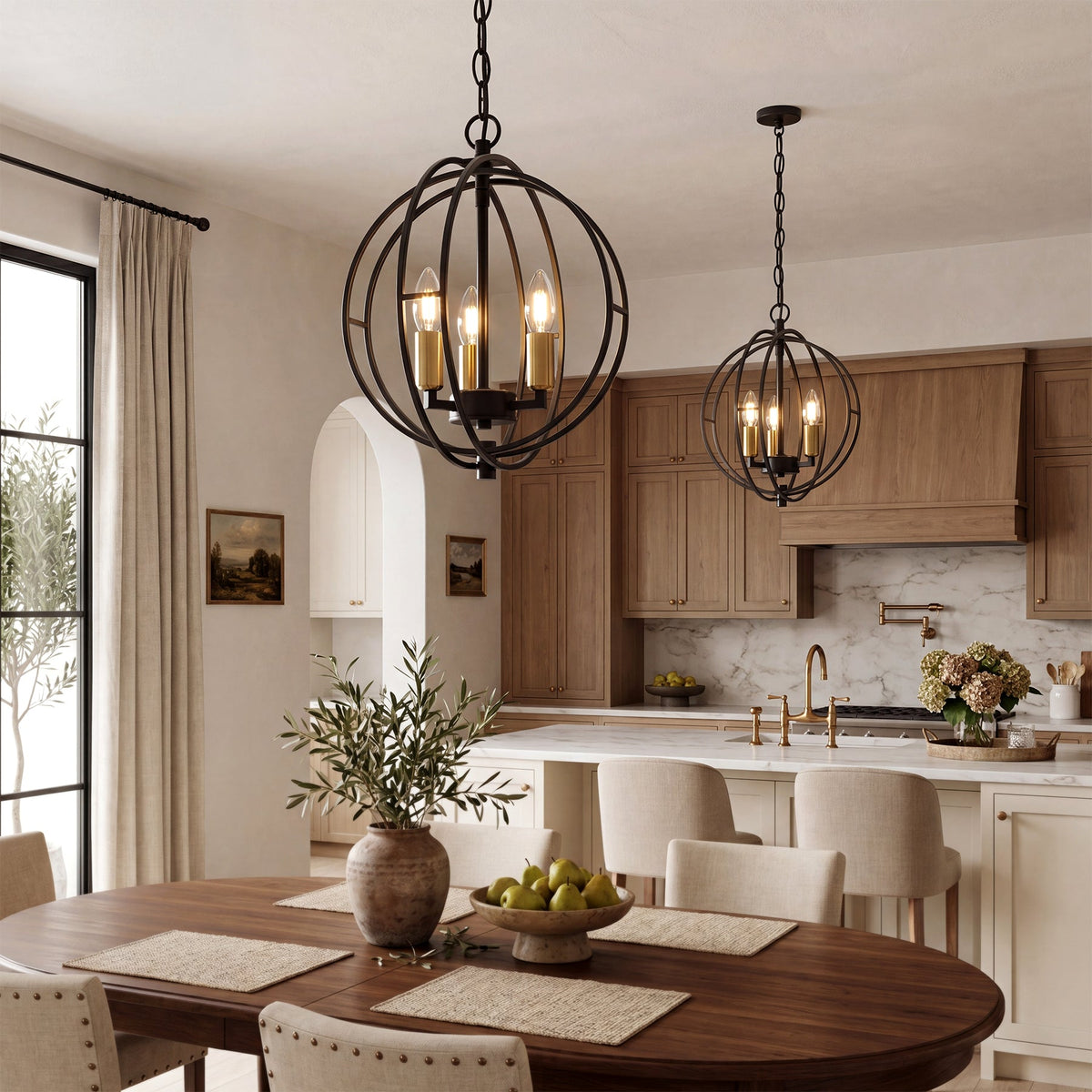 Black metal globe cage pendant light with three gold-finished bulbs, hanging over a dining table in a kitchen