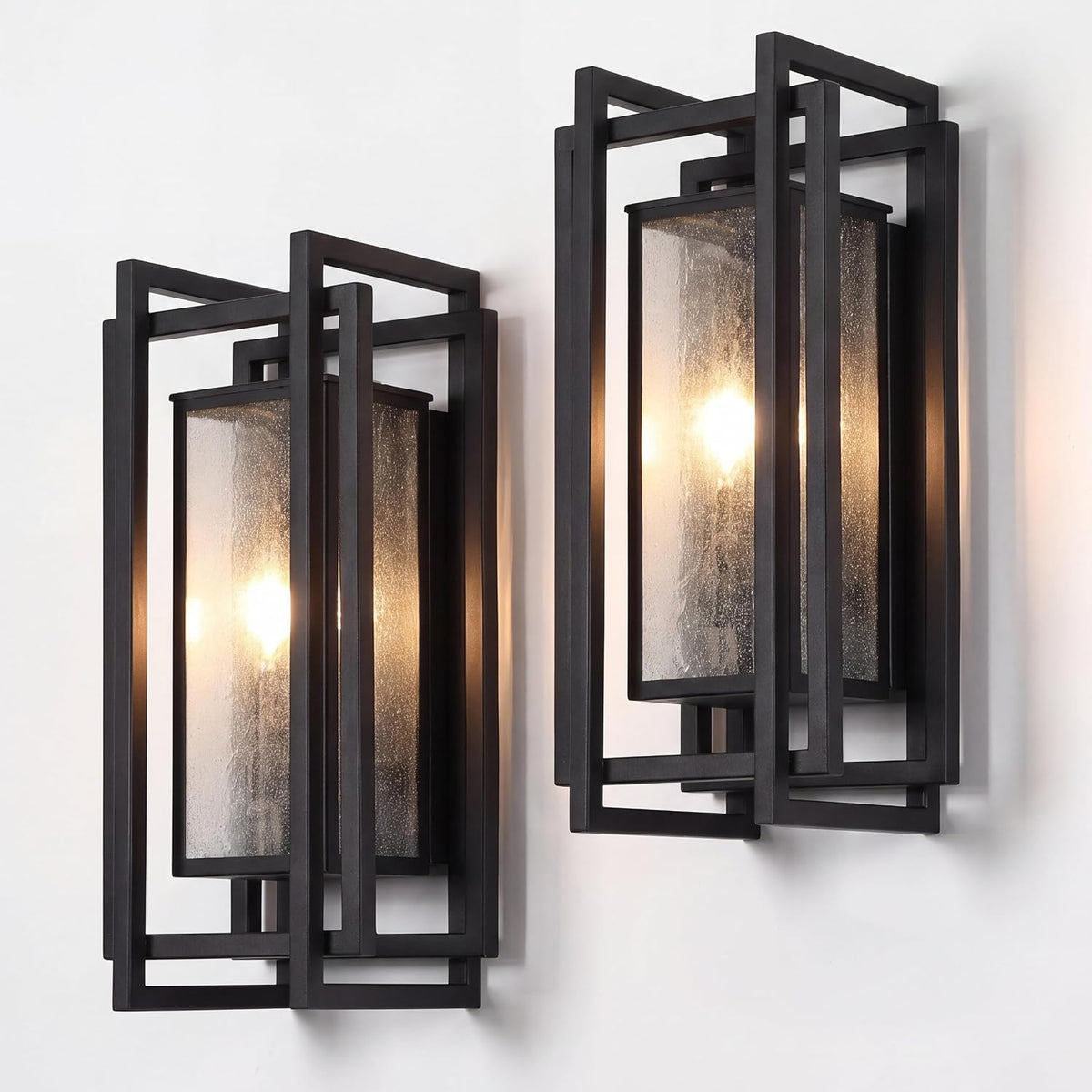 Black outdoor wall sconce with seeded glass, two-light design, shown at angle