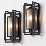 Black outdoor wall sconce with seeded glass, two-light design, shown at angle