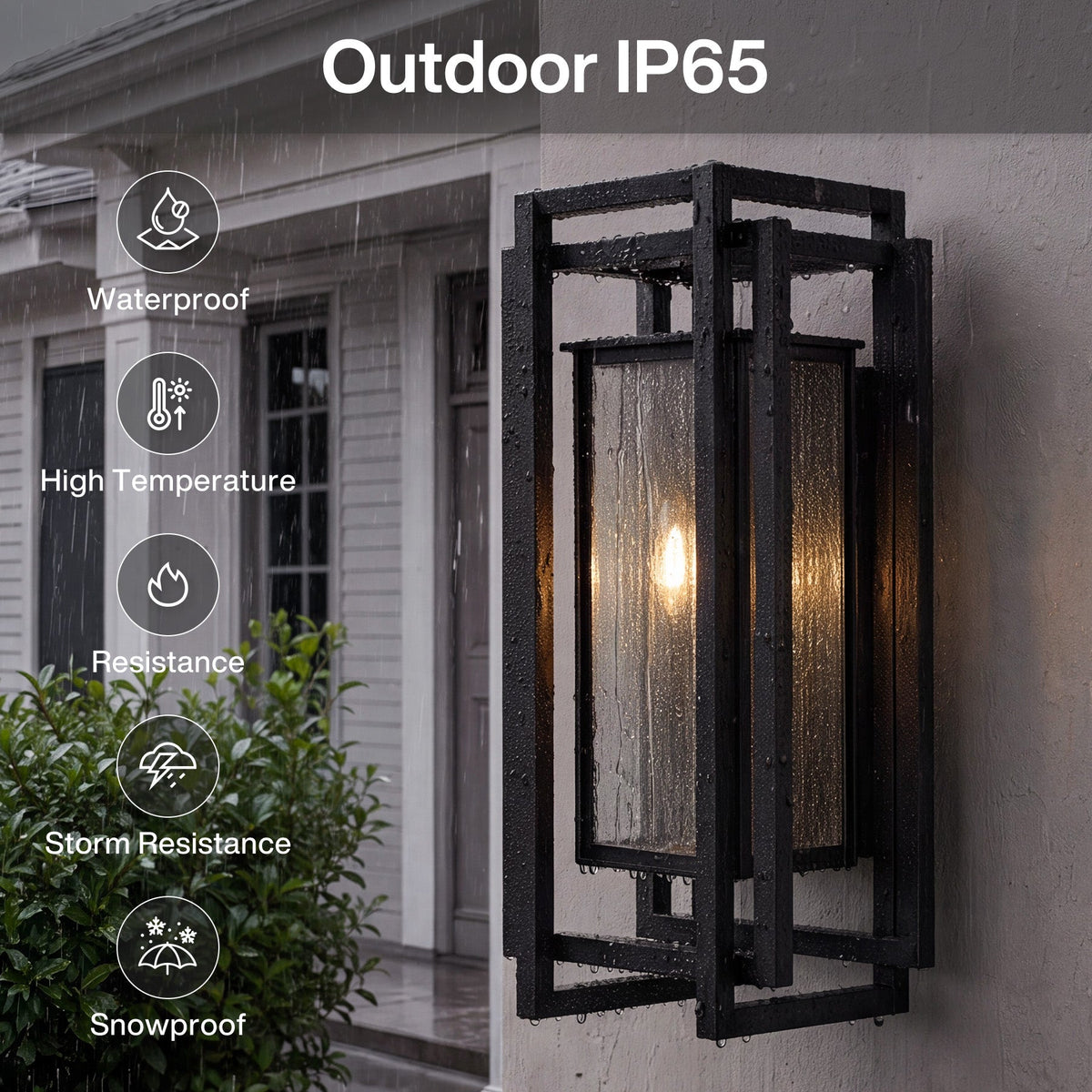 Black outdoor wall sconce with seeded glass, shown lit and raining, mounted on a wall