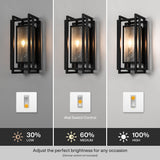 Black outdoor wall sconce with seeded glass, shown at three brightness levels via wall switch control