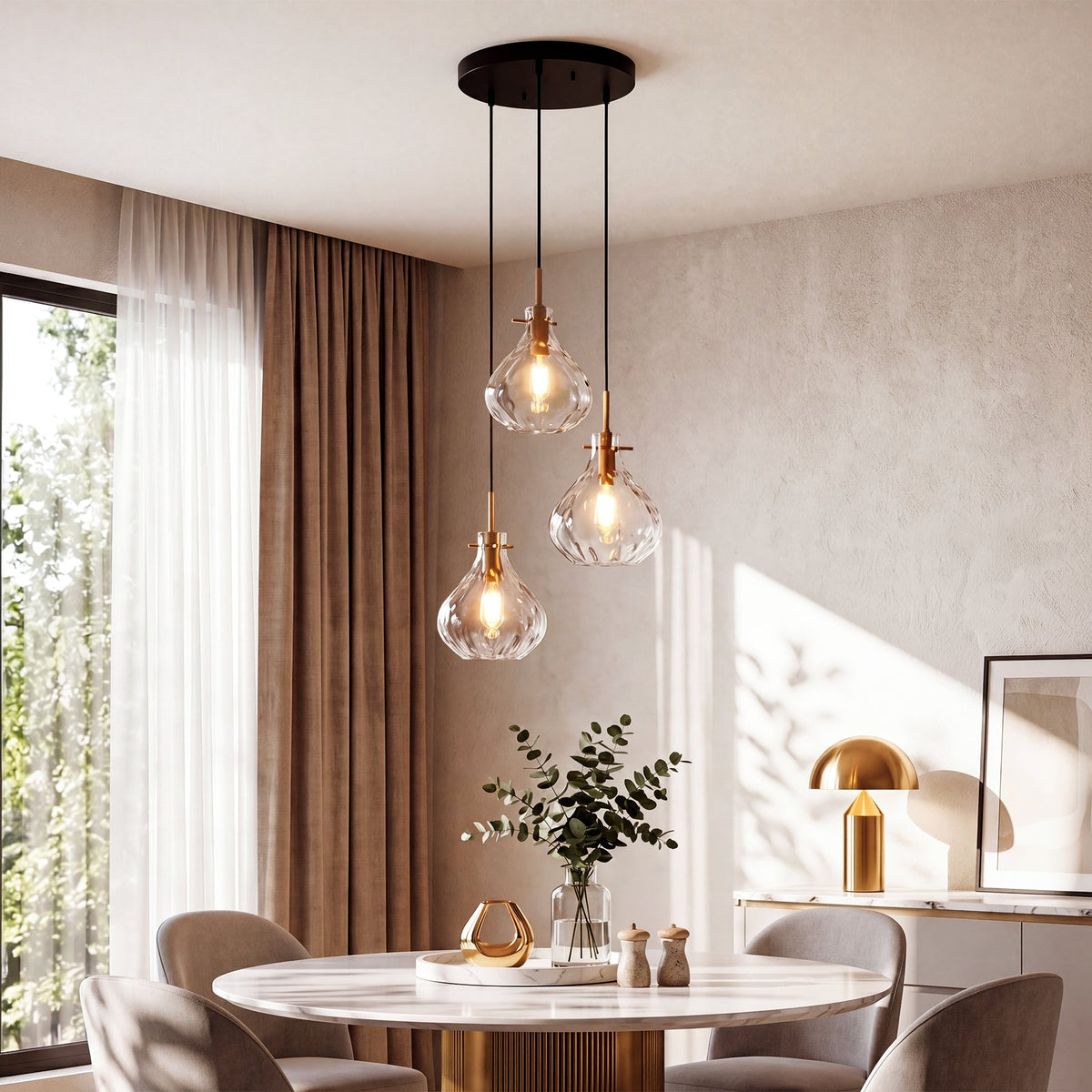 Black and gold three-light pendant with water ripple glass, hanging over a dining table