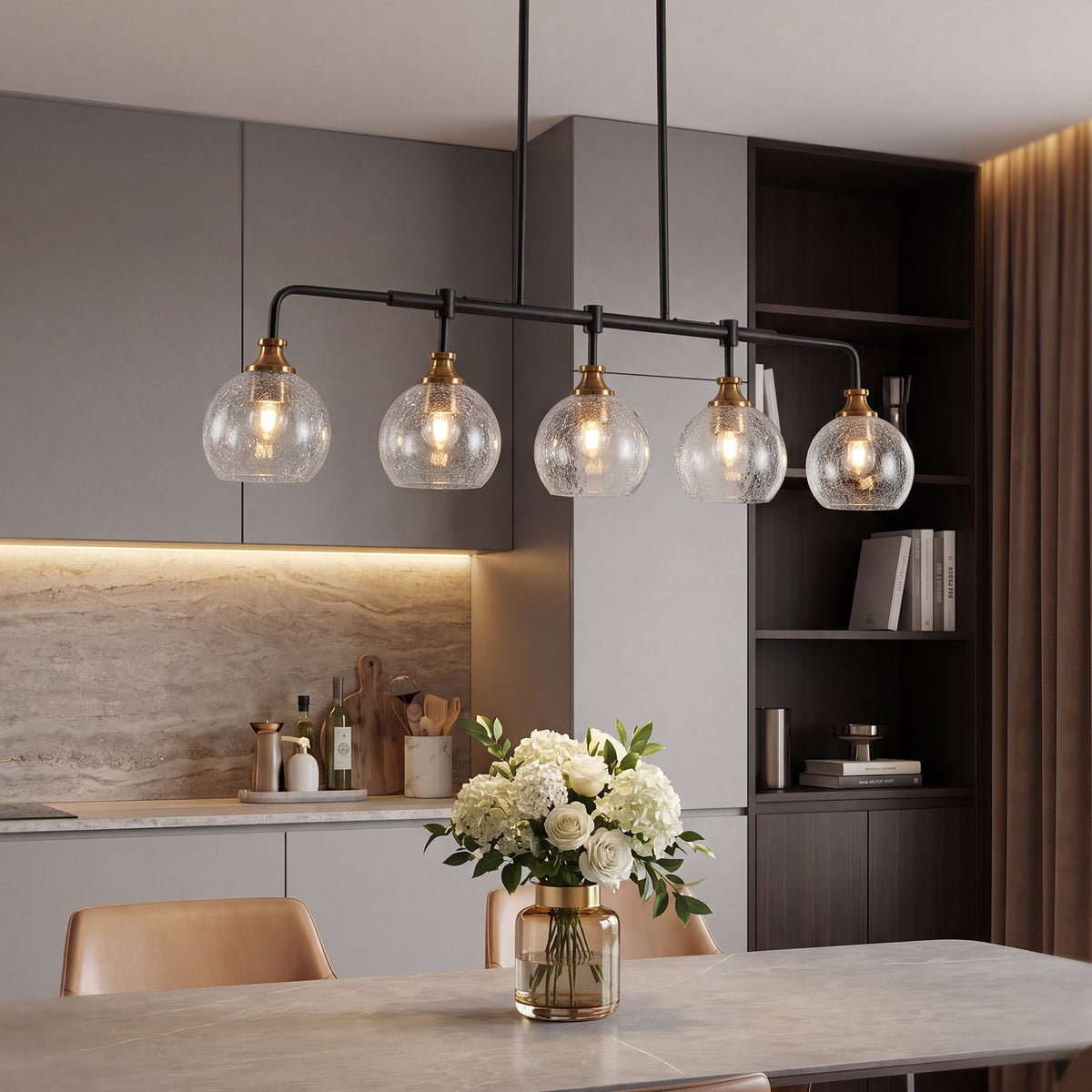 Five-light black and gold chandelier with crackle glass shades over a dining table