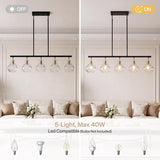 Five-light black linear chandelier with gold accents and ripple glass shades, shown in a living room setting with bulbs on and off