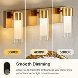Gold LED bathroom vanity light with three cylindrical shades showing 3000K, 4000K, and 5000K color temperatures