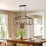 Black metal six-light farmhouse chandelier over wooden dining table in kitchen