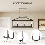Black metal six-light farmhouse chandelier with candle-style bulbs, shown hanging in a room