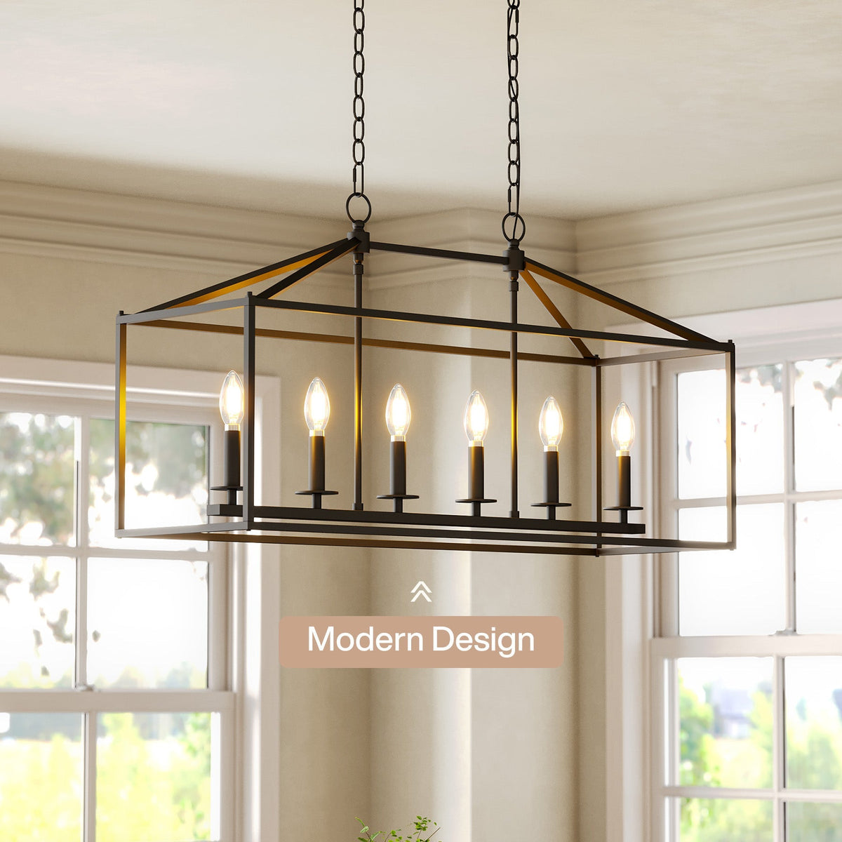 Black metal six-light farmhouse chandelier with candle-style bulbs, hanging in a kitchen near windows