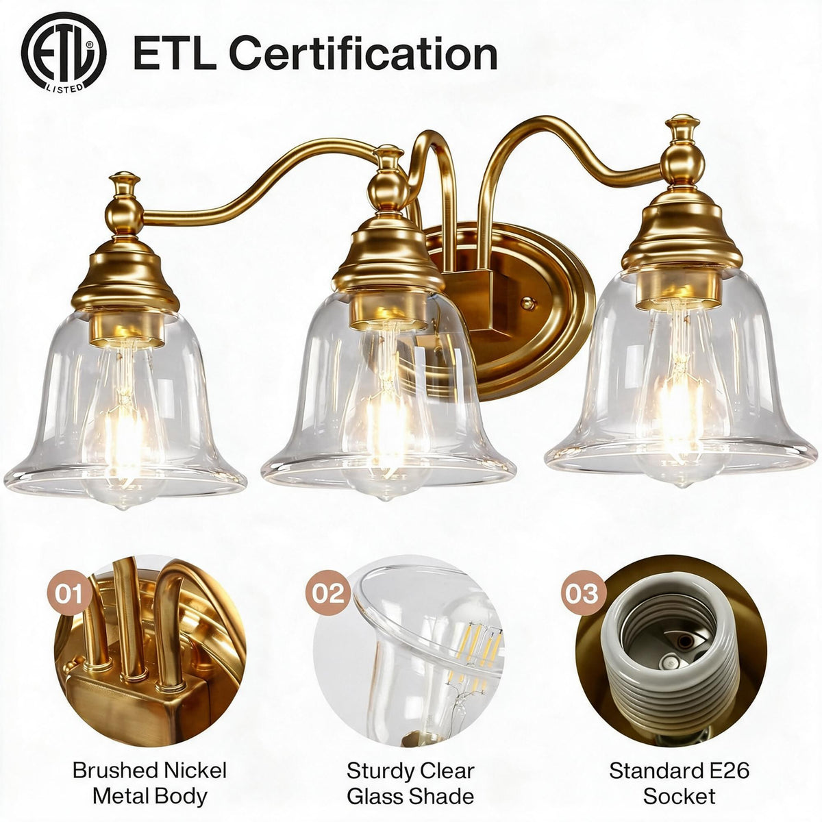 Close-up of gold bathroom vanity light showing brushed nickel body, clear glass shades, and E26 socket