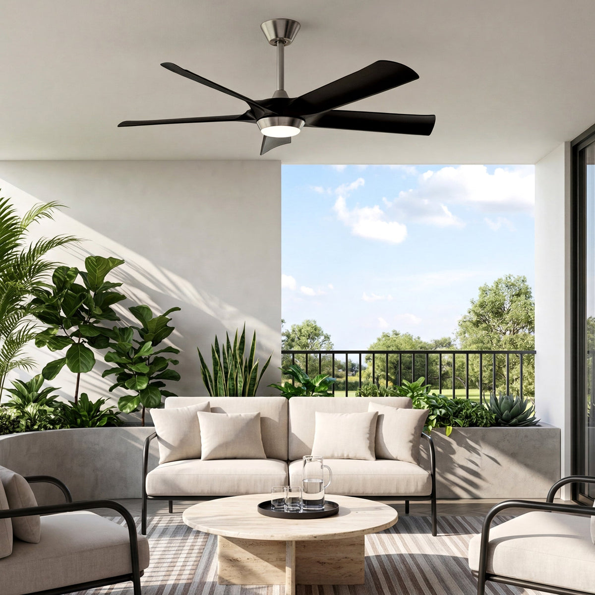 Black five-blade ceiling fan with integrated light, shown installed in a modern outdoor living space