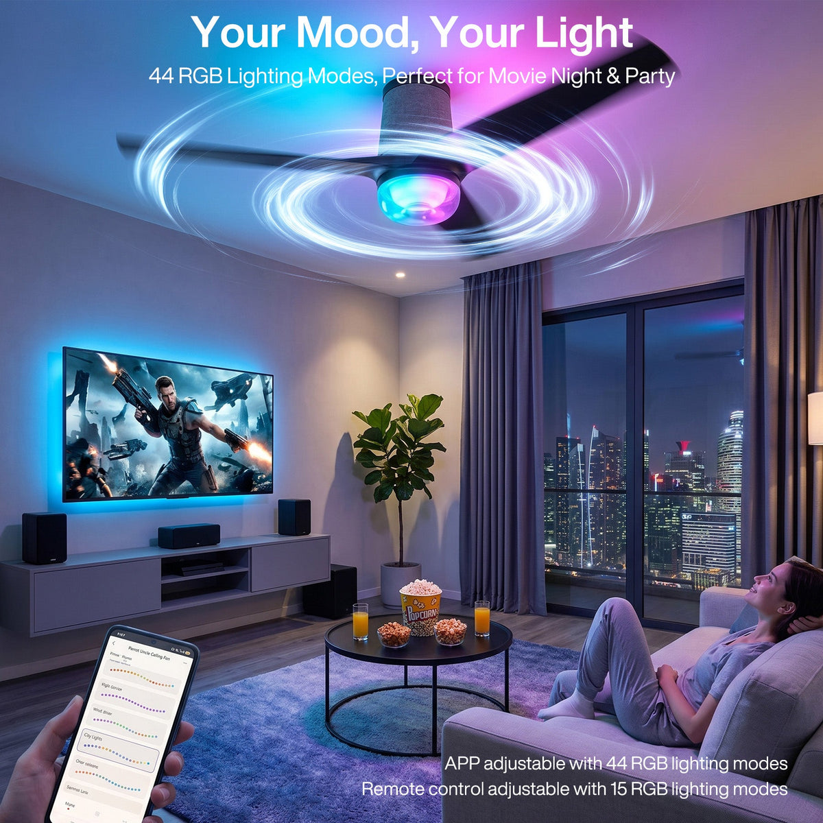 Black flush mount ceiling fan with RGB light, shown in living room with person using phone to control it