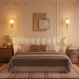 Gold crystal leaf wall sconce with fabric shade, shown on beige wall in bedroom setting