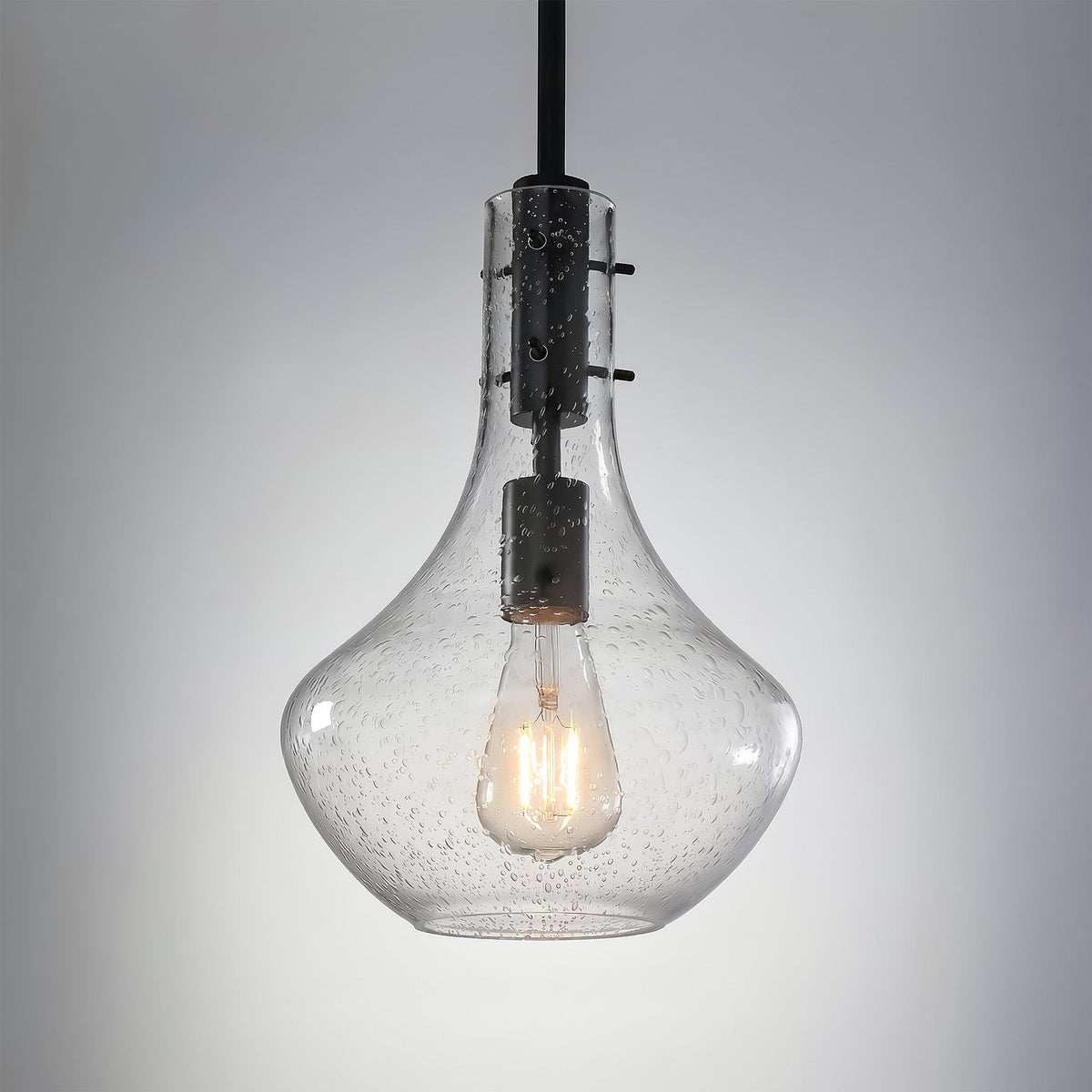 Black mini pendant light with bubble glass shade, shown from front angle
